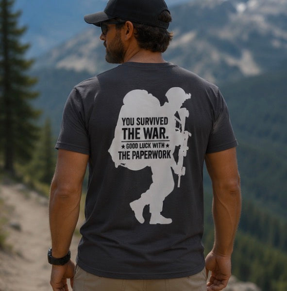 You Survived the War, Good Luck With The Paperwork T-Shirt (White Graphic)